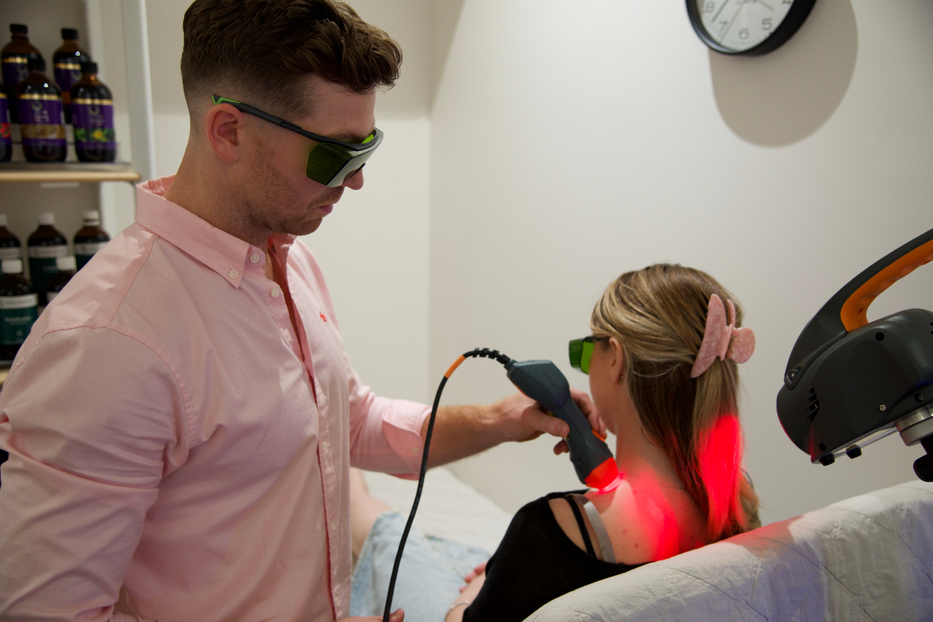 Professional MLS laser therapy treatment session in progress