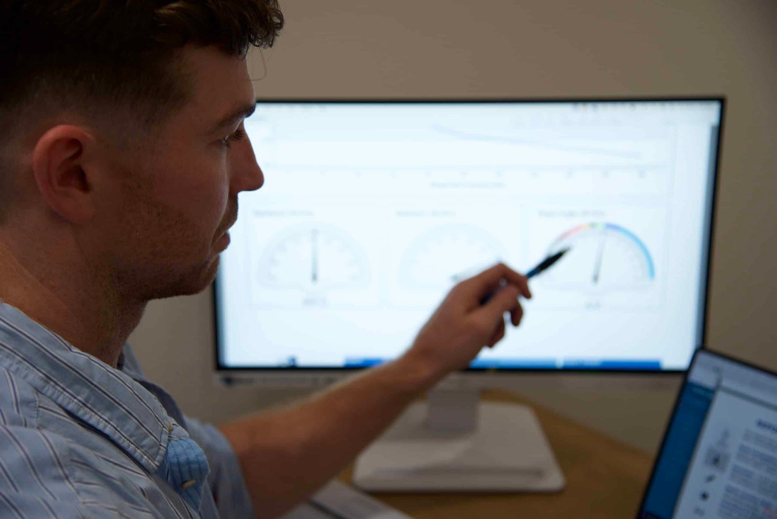 Naturopath showing test results to patient on a computer